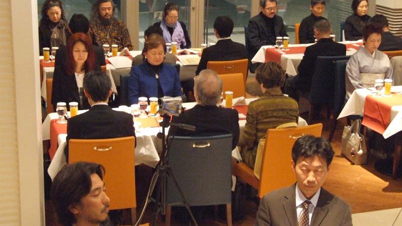 003group TM 2.jpg - 16 July 2008
Business leaders at a conference in Tokyo listen by teleconference to Raja John Konhaus, Raja of Invincible Japan, as he presents the formula for making their nation invincible.